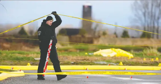  ?? NICK PROCAYLO/FILES ?? Abbotsford police Const. Rob Vroom investigat­es the scene of a suspicious death in 2009, one of many incidents that led to his post-traumatic stress disorder.