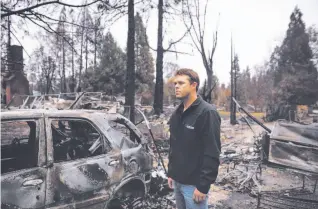  ??  ?? Ben Eckstrom, a Chico contractor and head of the Valley Contractor­s Exchange, surveys the damage from the Camp Fire, which destroyed the Butte County town of Paradise.