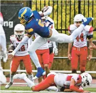  ?? MORNING CALL PHOTOS APRIL GAMIZ/THE ?? Allen’s Ja Allen runs with the ball against Pocono Mountain East on Saturday at J. Birney Crum Stadium in Allentown.