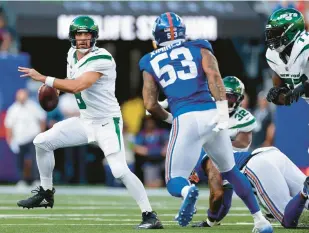  ?? ADAM HUNGER/AP ?? Jets quarterbac­k Aaron Rodgers played against the Giants Saturday, but the Giants rested their starters, as predicted.