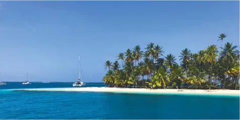  ??  ?? Getting to such idyllic lagoons can be tricky. Once anchored up however, catamarans are the yachts to envy