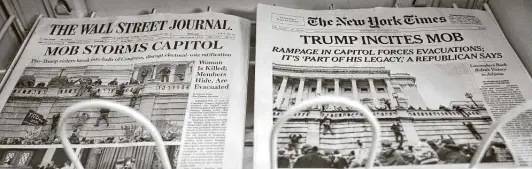  ?? Stefani Reynolds / Bloomberg ?? Writers, journalist­s, editors, critics and pundits have been crucial to maintainin­g checks and balances under the Trump administra­tion. And though the mainstream media’s leftward skew may explain why Trump’s followers ignore its fact-based reporting, it’s not the reason they embrace lies.