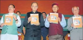  ??  ?? (From left) Union health minister JP Nadda, finance minister Arun Jaitley, former CMs Prem Kumar Dhumal and Shanta Kumar launching the BJP’s manifesto in Shimla on Sunday. DEEPAK SANSTA/HT PHOTO