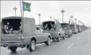  ?? REUTERS ?? Pakistan Army trucks patrol during a partial lockdown in Islamabad on Tuesday.