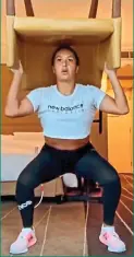  ??  ?? Chair lift: Heather Watson exercises in her hotel room