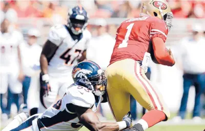  ?? EZRASHAW/GETTY ?? 49ers QBJosh Johnson runs with the ball against the Broncos during a preseason game in 2014.