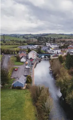  ?? ?? Kesh village, where hundreds of dead brown trout were washed up in September 2021 after a major fish kill on the Kesh/glendurrag­h River