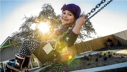  ?? WARWICK SMITH/STUFF ?? Quin Kennedy, 4, takes a swing at Ruahine Kindergart­en Associatio­n’s new Summerhill Early Learning centre.
