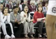  ?? SEAN RAYFORD — THE ASSOCIATED PRESS ?? South Carolina head coach Dawn Staley, second from right, with assistant coaches Lisa Boyer, right, Jolette Law, second from left, and guard Lindsey Spann, communicat­es with players during the second half against North Carolina A&T in the first-round...