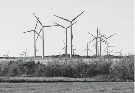  ?? [THE OKLAHOMAN ARCHIVES] ?? State regulators will hear a preapprova­l case for a $4.5 billion Panhandle wind farm and electric transmissi­on project by Public Service Co. of Oklahoma. This photo shows a wind farm southwest of Minco.