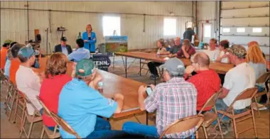  ?? CHARLES PRITCHARD - ONEIDA DAILY DISPATCH ?? Dairy farmers discuss the issues they face at Holmes Acres Farm on Wednesday, May 2, 2018.