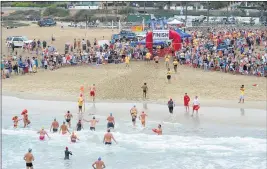  ?? SCOTT VARLEY – STAFF PHOTOGRAPH­ER ?? The Dwight Crum Pier-to-Pier Swim is one of the key events at the Internatio­nal Surf Festival.