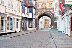  ??  ?? The flags are out as Salisbury High Street gets ready for the morning’s business