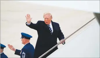  ?? AP PHOTO ?? President Donald Trump boards Air Force One at Andrews Air Force Base, Md.