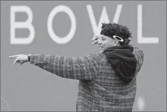  ?? ORLIN WAGNER/AP PHOTO ?? Chiefs quarterbac­k Patrick Mahomes celebrates during a Super Bowl parade and rally on Wednesday.