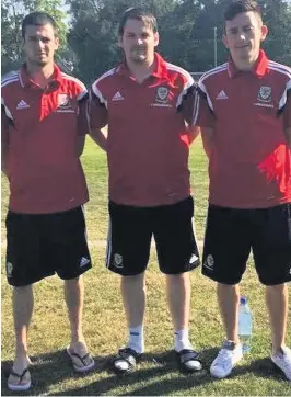  ??  ?? David Clarke (centre) on Wales duty