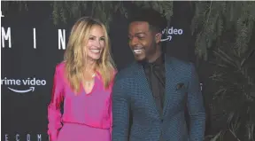  ?? CITIZEN NEWS SERVICE PHOTO ?? Julia Roberts, left, and Stephan James arrive at the Los Angeles premiere of Homecoming on Wednesday, Oct. 24.