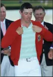  ??  ?? McIlroy was given the Arnold Palmer cardigan after his win