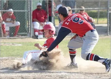  ?? RECORDER PHOTO BY CHIEKO HARA ?? Strathmore High School’s pitcher Zeke Flores, right, attempts to tag Lindsay High School runner Julio Godoy out as he slides into home to score a run Thursday, May 17, in the bottom of fourth inning in the CIF Central Section Division VI baseball...