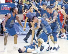  ?? ?? Robert Bolick and his teammates celebrate after forcing the draw versus Team Japeth in the PBA All-Star Game in Bacolod Sunday.