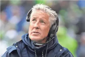  ?? KIRBY LEE/USA TODAY SPORTS ?? Seahawks coach Pete Carroll, above, fired offensive coordinato­r Darrell Bevell and offensive line coach Tom Cable.