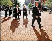  ?? CHIP SOMODEVILL­A / GETTY IMAGES ?? Jay Nanavati (left), Richard Westling, Thomas Zehnle and Kevin Downing, attorneys for ex-Trump campaign chair Paul Manafort, arrive at court Tuesday for the 11th day of Manafort’s trial in Alexandria, Virginia. Manafort is charged with bank and tax fraud.