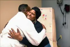  ?? Nate Guidry/Post-Gazette ?? Dr. Steven Evans, cancer surgeon at UPMC Hillman Cancer Center, hugs patient Kelli Brock, of East Liberty, following a consultati­on at UPMC Hillman Cancer Center in Shadyside.