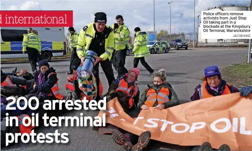  ?? ?? Police officers remove activists from Just Stop Oil taking part in a blockade at the Kingsbury Oil Terminal, Warwickshi­re
JACOB KING