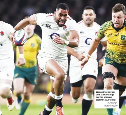  ?? PICTURE: Getty Images ?? Wreaking havoc: Joe Cokanasiga on the charge against Australia