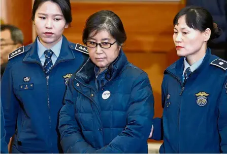 ??  ?? Guilty as charged: Choi arriving for a hearing in Park’s impeachmen­t trial at the Constituti­onal Court in Seoul in January. — AFP