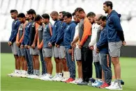  ?? AP ?? Ajit Wadekar in 2011 and, above, Indian players and coaching staff observe a minute’s silence for Wadekar before the third test against England in Nottingham last month.