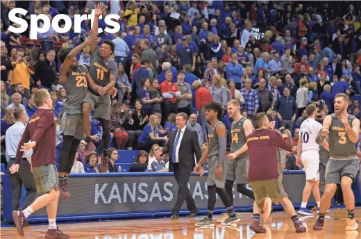  ?? ORLIN WAGNER/AP ?? Arizona State’s Romello White (23) and Shannon Evans (11) celebrate after the Sun Devils defeated Kansas in Lawrence, Kan., on Sunday.