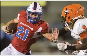  ?? (Democrat-Gazette file photo) ?? Quarterbac­k Cannon Turner (21) led Arkadelphi­a to a share of the 4A-7 Conference title last season. But now that Turner has graduated, the Badgers will look to continue their recent success with senior Braden Thomas as their starter.