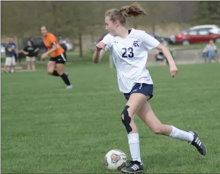  ?? PHOTOS BY GEORGE POHLY — MACOMB DAILY ?? Richmond’s Liz Kocher moves the ball against Armada. Kocher assisted on the only goal of the BWAC match.