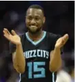  ?? DAVID T. FOSTER III/CHARLOTTE OBSERVER ?? The Hornets’ Kemba Walker celebrates a call against the Miami Heat during Game 3 on Saturday.