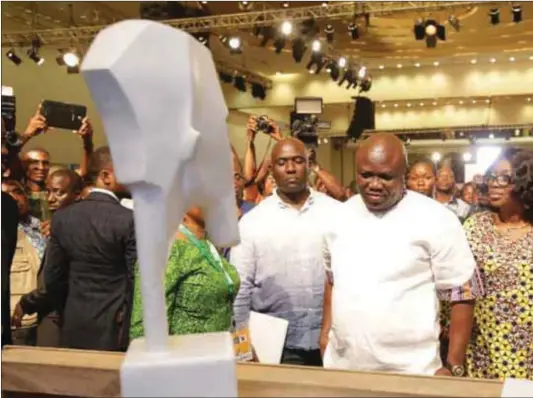  ??  ?? Minister of Informatio­n and Culture, Alhaji Lai Mohammed, Lagos State Governor, Akinwumi Ambode and other dignitarie­s admiring art works at Art Expo in in Lagos...recently