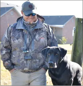  ??  ?? Allison and Deke take a break during a training session. (NWA Democrat-Gazette/Annette Beard)