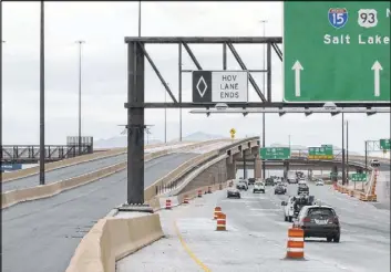  ?? Bizuayehu Tesfaye Las Vegas Review-Journal @bizutesfay­e ?? The newly completed HOV flyover ramp in the Spaghetti Bowl will open to traffic Monday morning. Monday will see the launch of a single continuous HOV lane in each direction stretching from Silverado Ranch Boulevard on I-15 to Elkhorn Road on U.S. Highway 95.