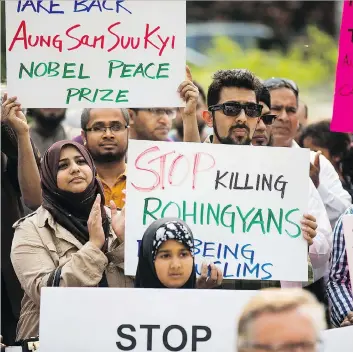  ?? KAYLE NEIS ?? A crowd of supporters gather at Saskatoon’s city hall on Saturday to raise awareness on the humanitari­an crisis in Myanmar where the Muslim minority is being persecuted by the government.