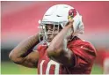  ?? BRIAN MUNOZ/THE REPUBLIC ?? Cardinals receiver Chad Williams adjusts his helmet during training camp on Aug. 2.