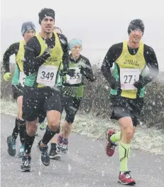  ??  ?? Yaxley runners in the Folksworth 15 in 2018.