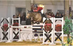  ??  ?? Holly Cooper steers Valentino Supreme to a JC qualifier triumph