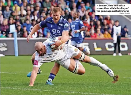  ?? Martin Rickett ?? > Exeter Chiefs’ Will Witty scores their side’s third try of the game against Sale Sharks