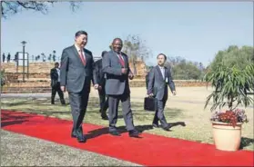  ??  ?? State visit: China’s President Xi Jinping (left) and President Cyril Ramaphosa (right) in Pretoria last month. Photo: Phill Magakoe/AFP
