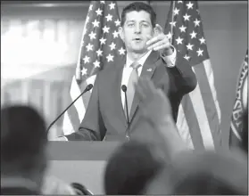  ?? AP Photo/Jacquelyn Martin ?? Stepping down: House Speaker Paul Ryan of Wis., calls on a reporter after announcing that he will not run for re-election at the end of his term, Wednesday on Capitol Hill in Washington.