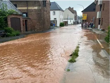  ?? ?? Clockwise from main picture: Flooding in Erftstadt; The Holt School unveiled a memorial to teacher James Furlong; Twyford Beer Festival; Sonning 10k returned; and fans celebrate England reaching the Euro 2020 finals