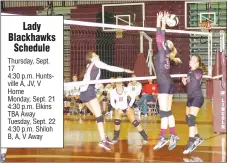  ?? Staff photograph by Mark Humphrey ?? Laura Socha plays the ball over the net while teammate Kimberly Ortiz looks on and a pair of Lincoln defenders try for a block. Pea Ridge prevailed over the Lady Wolves in a three-game sweep (2519, 25-15, 25-12).