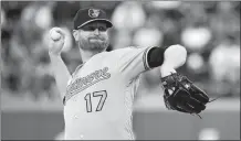  ?? FRANK FRANKLIN II/AP PHOTO ?? Baltimore’s Alex Cobb delivers a pitch during the first inning of Tuesday’s game against the Mets at Citi Field. Baltimore won, 2-1.