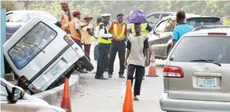  ?? Photo: NAN ?? An accident scene at Costain roundabout in Lagos yesterday