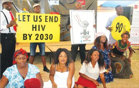  ?? — (Picture by Tariro Kamangira) ?? Iyasa entertainm­ent group performs during the launch of Icon Gold condoms in Harare on Saturday.